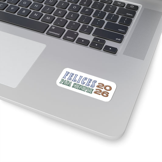 Laptop with a sticker reading 'Felices para siempre 2026' on a white background