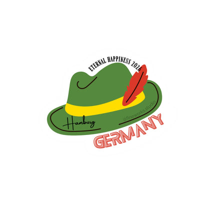 Green hat with red feather and 'Germany' and Eternal Happiness 2026 text on a white background