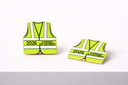 Two yellow safety vests with '2026 Parking Department' text on a white background